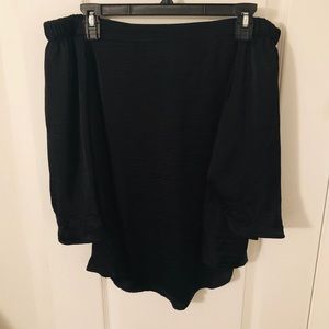 Jennifer Lopez off the shoulder loose black top